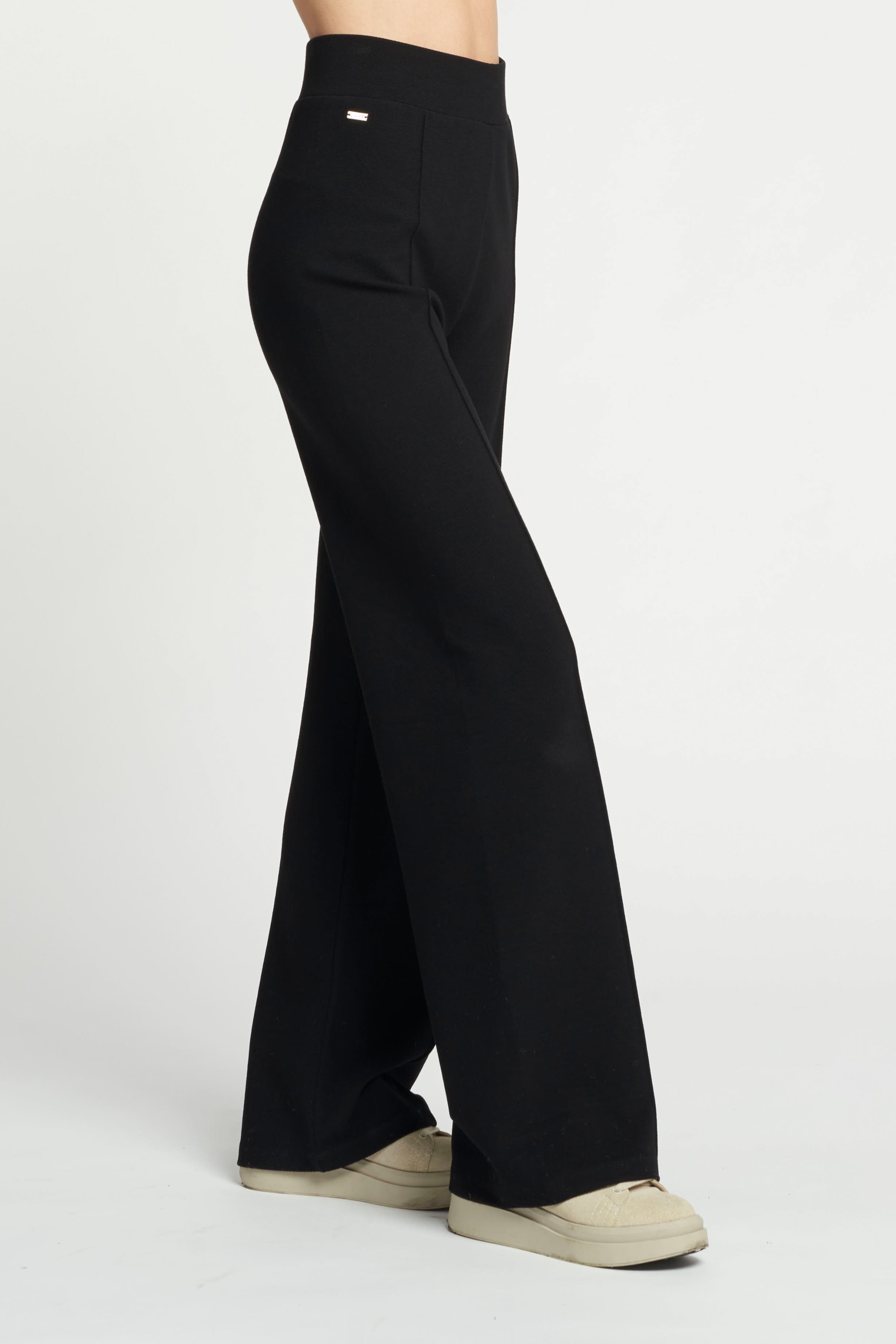 FOREST ESSENTIEL flared pants - Black