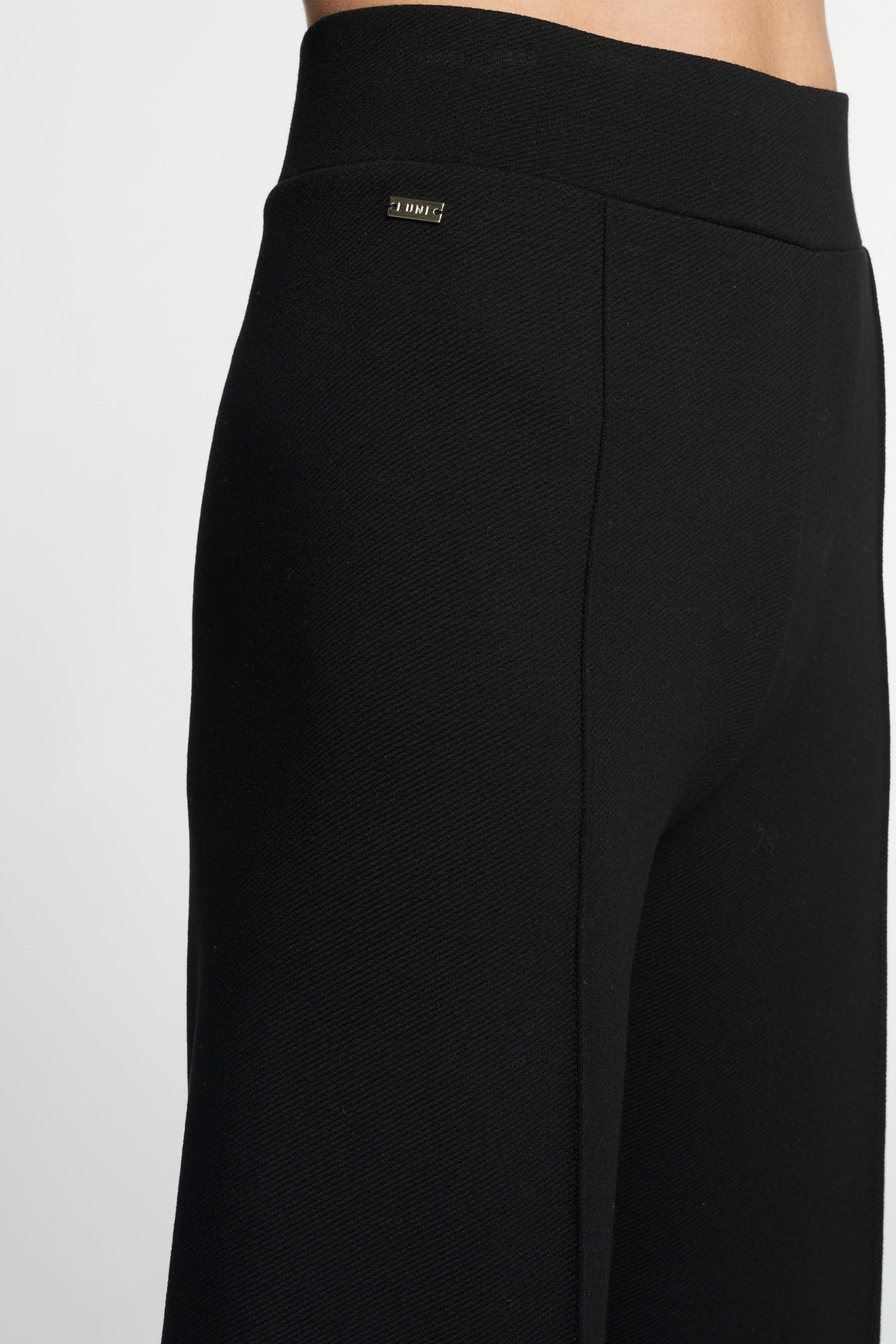 FOREST ESSENTIEL flared pants - Black